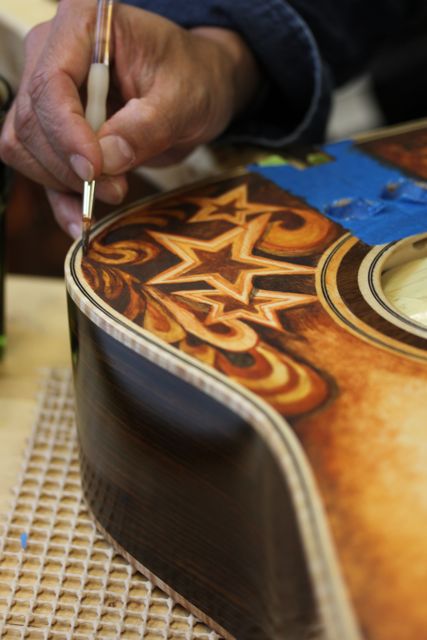Clark Hipolito (art-company.com) custom design on a custom Lichty Guitar for Mike Gossin
