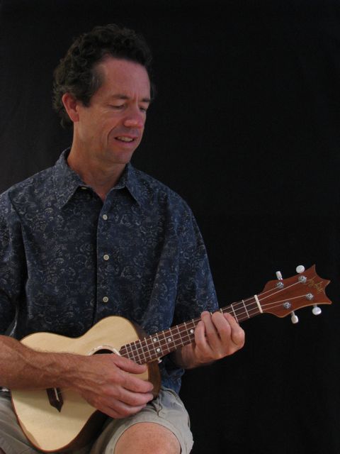 Jay playing a handcrafted Lichty ukulele