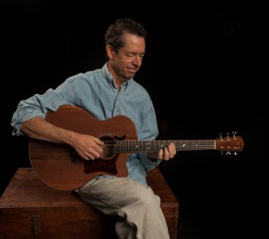 Jay Lichty on custom small jumbo chechen guitar